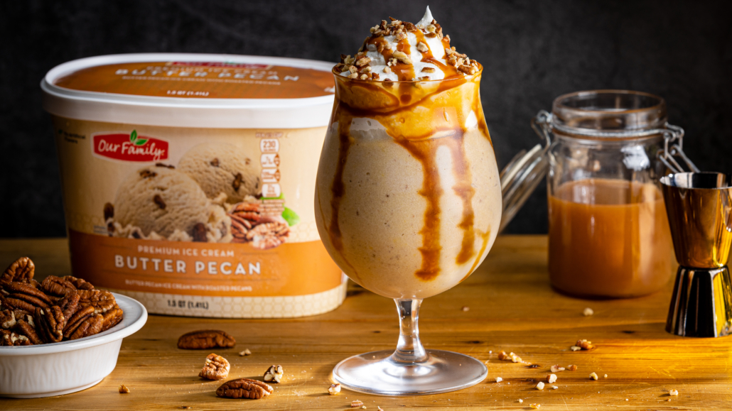 a delicious, topping-filled beige butter pecan milkshake made from real butter pecan ice cream.